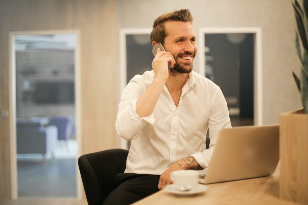 Man phone calling English for Chief Financial Officers managers and specialists working in finances with ambition - learning foreign languages online with a language school - business english courses online